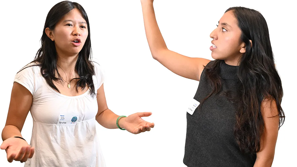 Lily Pham and Maya Velasco in action at poster session
